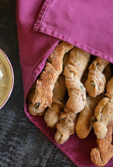 twisters with rosemary and capers