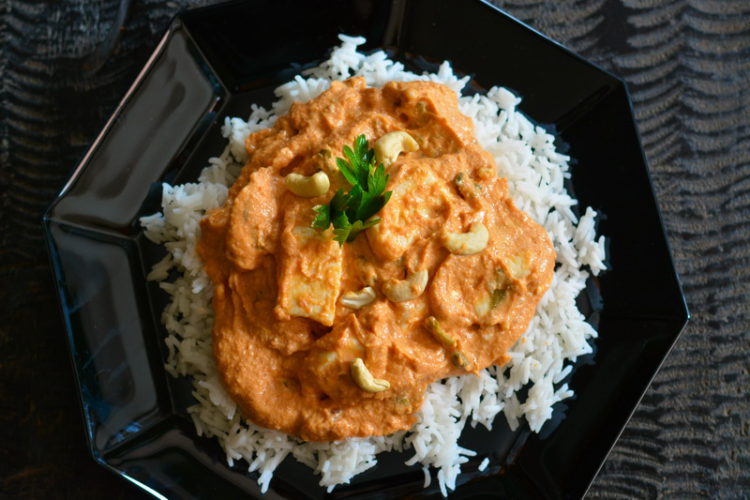 cheese in cashew tomato sauce