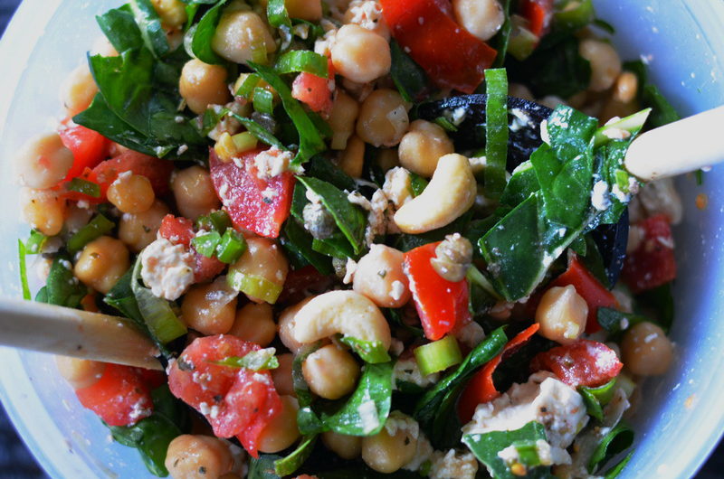Fresh cheese, spinach and tomato salad with chickpeas